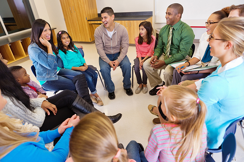 group discussion with principal, educators, parents and children